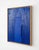 'Center Disruption' in cobalt features a matte center shape with high gloss lines in a white oak frame. Artist and...