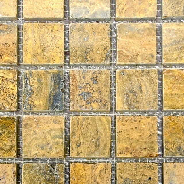 Polished and unfilled gold travertine 1" x 1" decorative mosaic tile. Suitable for use in vertical and horizontal...