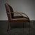 Designed by Global Views, the Swoop Chair features a graceful continuous bronze-finished iron frame wrapped around a...