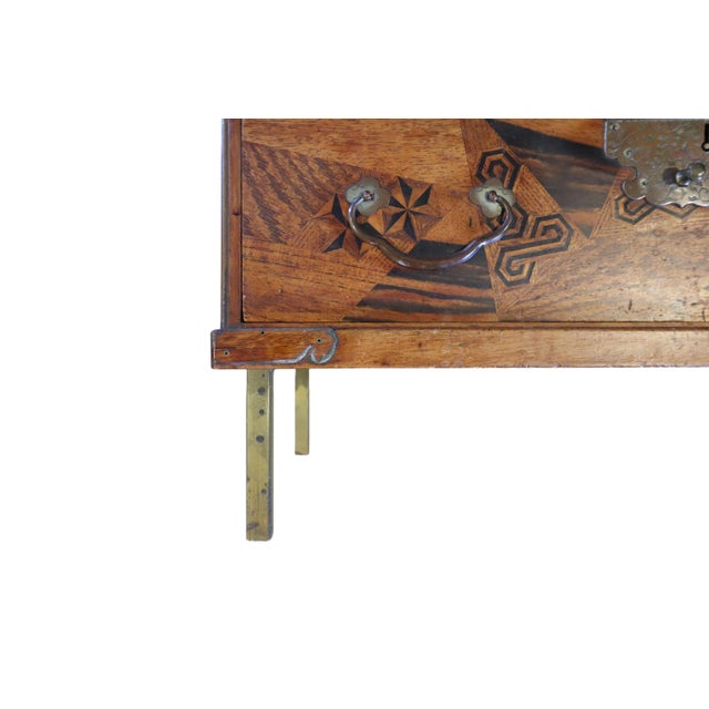 Wonderful Raised Japanese Cabinet Crafted With Geometrically Intricate Inlayed Wood and Hand Wrought Hardware For Sale - Image 11 of 12