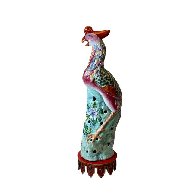 A striking Chinese Export porcelain phoenix bird dating to the late 19th century or circa 1900. This impressive figure is...