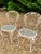 A romantic three-piece wrought iron garden set in the iconic “Chantilly Rose” pattern attributed to Woodard of Owosso,...
