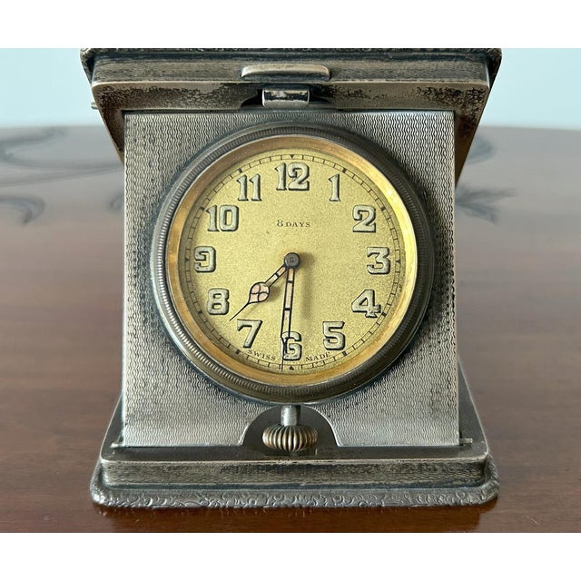 William Base & Sons Art Deco silver and enamel table clock, Birmingham, 1927 Rectangular in shape with a hinged lid with a...