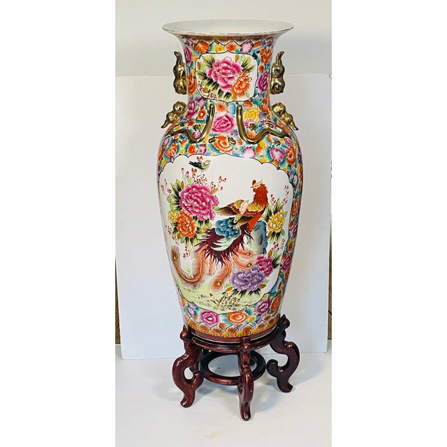 Spectacular vintage Chinese Chinoiserie porcelain Handpainted with Phoenix birds and peonies, gold enamel floor vase. On a...