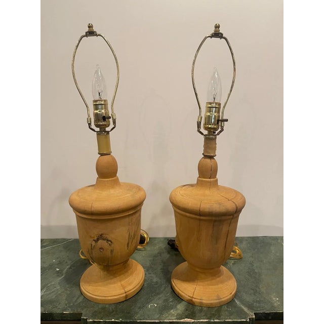 19th century pair of capitol fragments adapted as lamps.