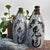 Decorative set of two Japanese glazed ceramic sake bottles (Tokkuri, 徳利). Dimensions: height 30 cm, diameter 12 cm. These...