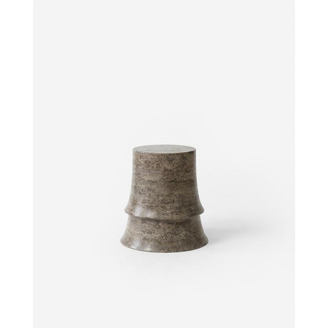 Bellissimo Low Stool in Travertine by Pietro Franceschini. Dimensions: Ø 44 x H 43.5 cm Materials: Travertine. This...