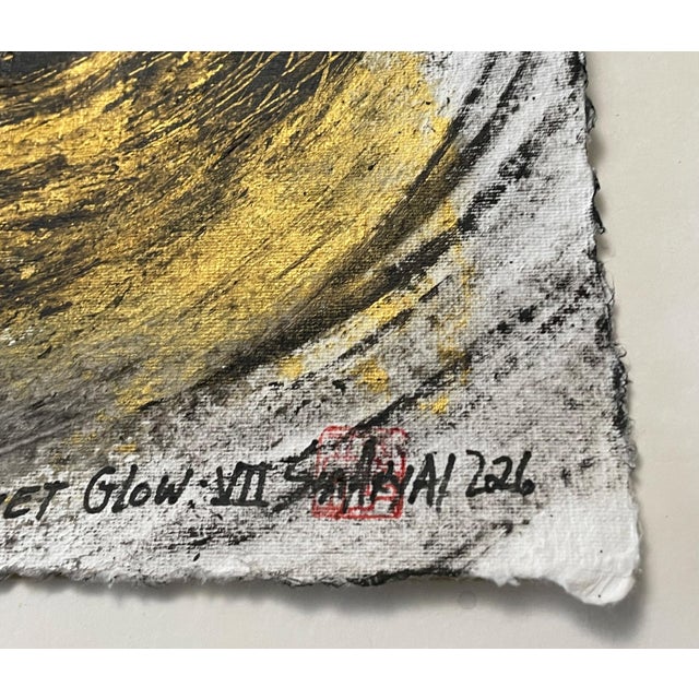 An original abstract mixed-media artwork created on handmade paper, where concentric circles of luminous gold leaf shimmer...