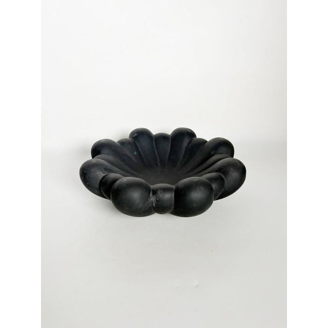 Decorative plaster catchall made in France during the 1960s. The piece features an organic, flower-inspired form composed...