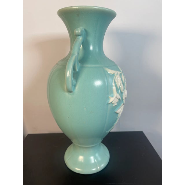 Cameo Rose pattern by Weller Pottery was produced from 1935 through 1939, and this large double handled urn shaped vase is...