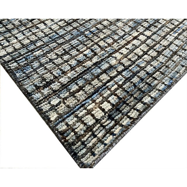 Beautiful hand knotted modern and fashionable collection of borderless designs rug, made of 75% wool and 25% cotton in...