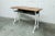 Refurbished 1960s school desk in good condition, white painted frame, black undertop. Can be used as an entrance hall...