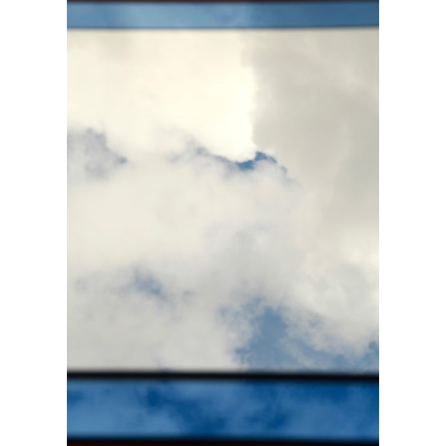 This is a large elegant space age mirror designed and produced in Italy during the 60s. The external blue frame comes in...