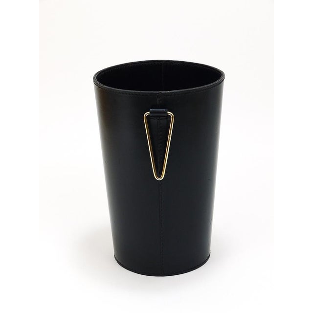 A beautiful and elegant, vintage Mid-Century Modern paper basket / paper bin from the 1950s. Designed an executed by...
