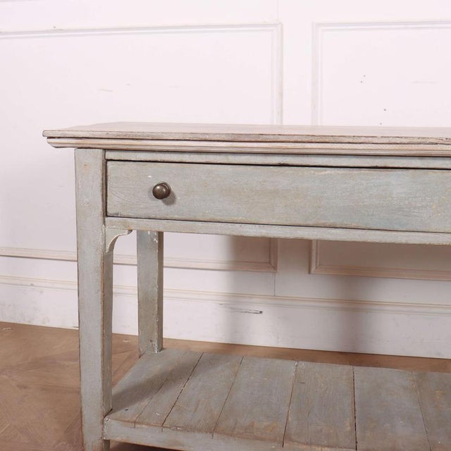 Early 19th C English 2 drawer painted potboard dresser base with a scrubbed and bleached oak top. 1830 This piece is...