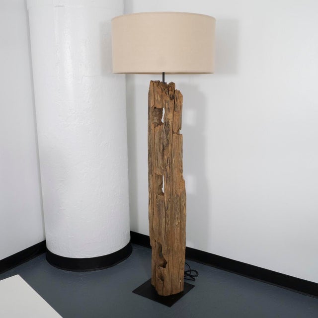 Natural driftwood floor lamp. Includes original shade.