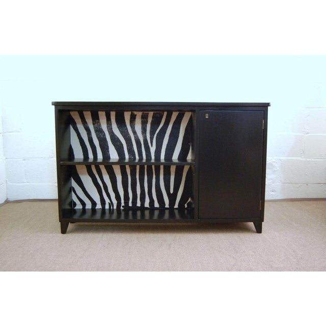 Fabulous Art Moderne black lacquered writing desk with bookcase and lockable cabinet on front and curved desktop, pencil...