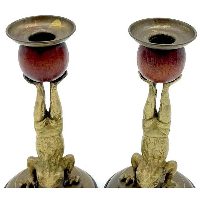 A Pair of Acrobatic Frog Brass & Wood Candlesticks by Arthur Court, 1979 Add a whimsical touch to your interior, consider...