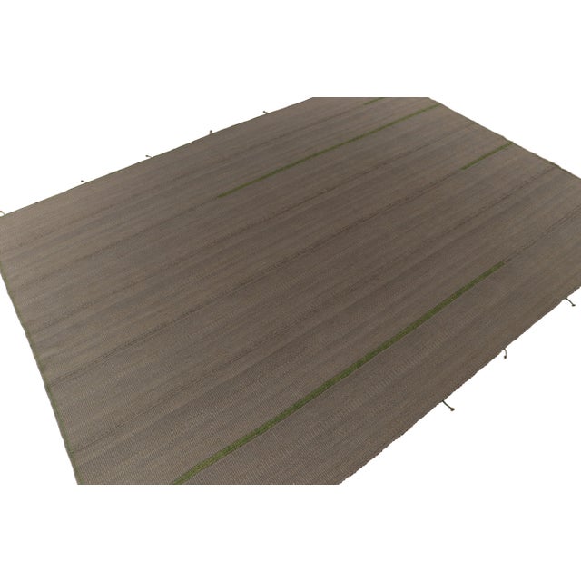 Handwoven in wool, a 12x16 Kilim from a bold new line of contemporary flatweaves by Rug & Kilim. On the Design: Connoting...