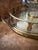 The perfect drink tray, with pineapple rails to prevent spills. Aged brass with some patina, authentic 1970s design....