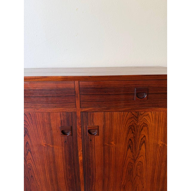 Exceptional mid-century modern Danish sideboard crafted in richly grained rosewood by Brouer Møbelfabrik. This piece...
