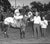 1965 black and white photograph of Sweepstakes in the winner's circle at Marble Downs in Carthage, Missouri. Jockey Steve...