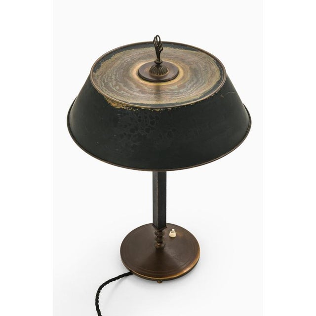 This very rare table lamp, model 6942, was designed by Arvid Böhlmark and produced by Arvid Böhlmarks Lampfabrik in Sweden...