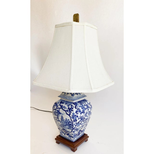 Stunning Vintage Chinoiserie ginger jar lamp with custom raw silk shade and wood base. Obtained from old Chinese family's...