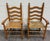 This is a gorgeous vintage pair of Country French style armchairs crafted from solid oak with traditional ladder-back...