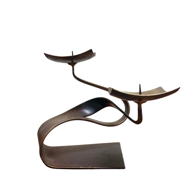 Striking vintage artisan candle holder by Ferart, featuring an expressive sculptural form crafted from bent and shaped...