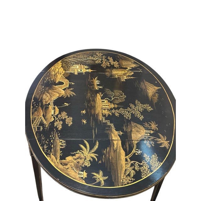 Vintage Black Lacquer Chinoiserie Drop-Leaf Table With Drawers A beautifully detailed vintage black lacquer drop-leaf...