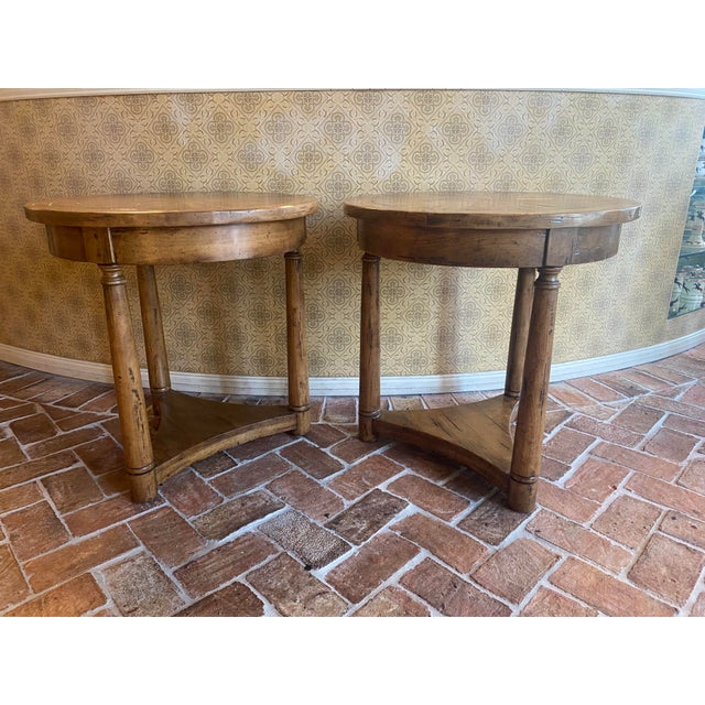 Bausman's round side table with lower shelf features a classic pie top with hi lo planking. Alder wood table in a premium...