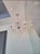 Set of 2 matching crystal chandeliers in excellent conditio All lights working perfectly.Beautiful multi-arm crystal...
