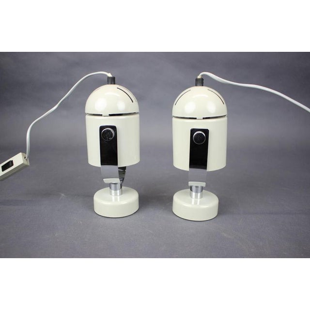 Pair of vintage adjustable wall lamps designed by Stanislav Indra and manufactured in Czechoslovakia during the 1970s. The...