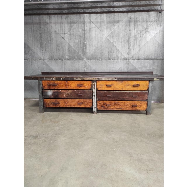 Heavy-duty industrial workbench, an impressive 3 metres wide. Featuring a metal worktop, solid metal frame and large...