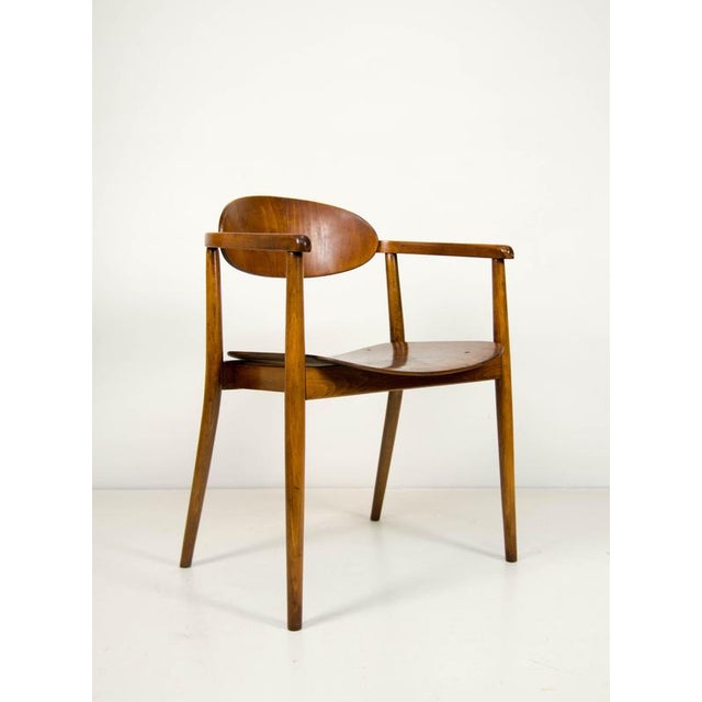 Rare and elegant all-wood chair designed by antonín šuman for ton (former thonet) in the 1960s. A refined example of...
