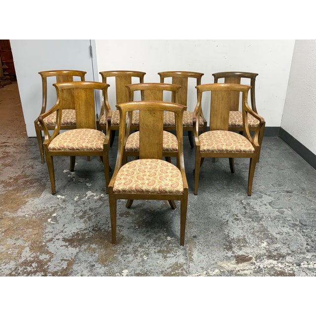 Design Plus Gallery presents a Vintage Set of Eight Palladian Dining Chairs from Baker Furniture. This set includes six...
