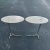 Pair of gray tone birdseye maple top, chrome base cantilever side tables. These tables are great for a multiple seating...