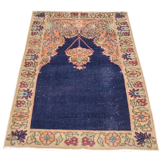 Hand-knotted with care using traditional rug-making techniques, this wool rug blends timeless craftsmanship with a modern...