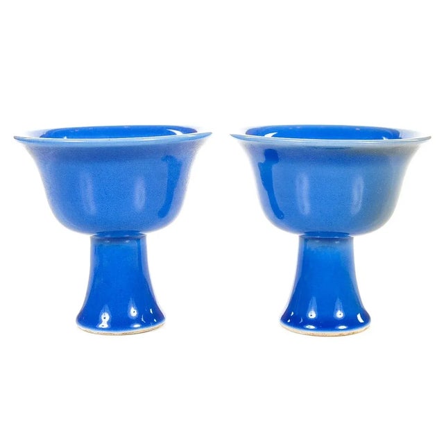 Chinese antique pair of blue porcelain drinking libation cups.