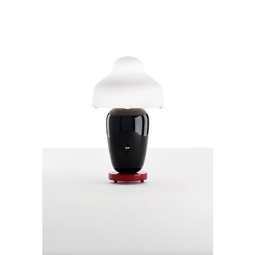 Jaime hayan chinoz black-burgundy base table lamp for parachilna asian inspired table lamp. Consisting of a mouth-blown...