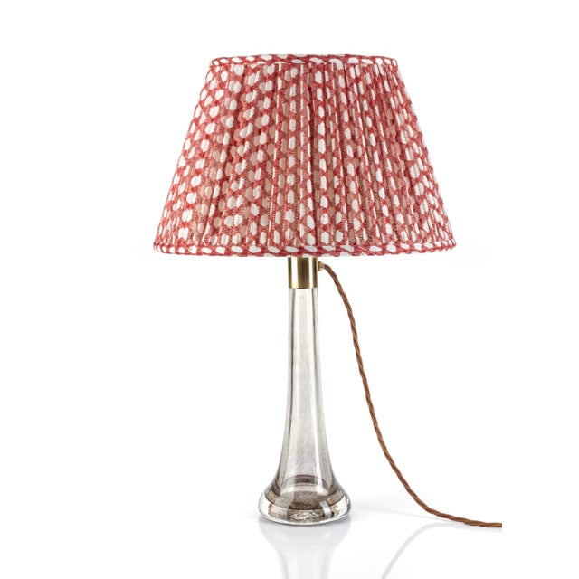 Fermoie lampshades are artisanal, British-made lighting fixtures renowned for their rich, textured fabrics, soft geometric...