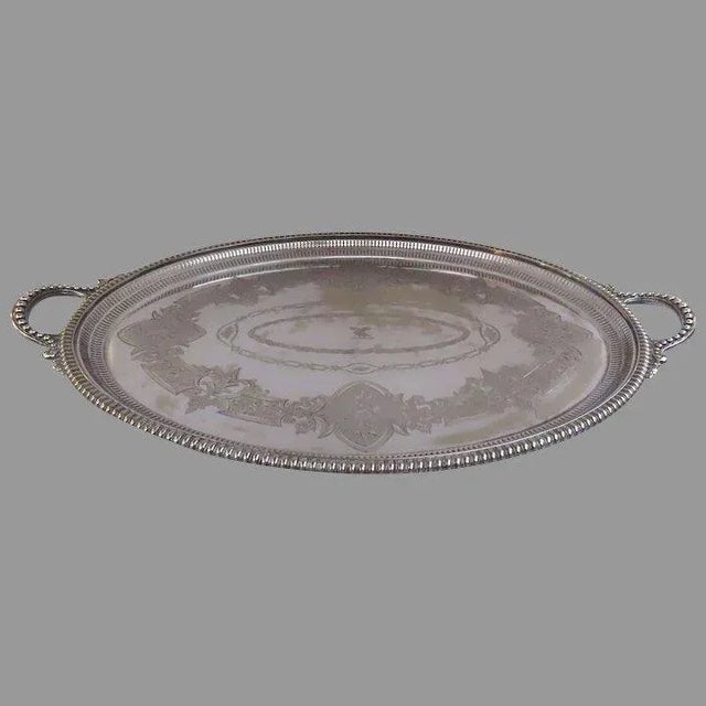 Large Silver plate Tray, third quarter 19th century. By James Dixon & Sons, Sheffield. Marked on the back. Oval with...