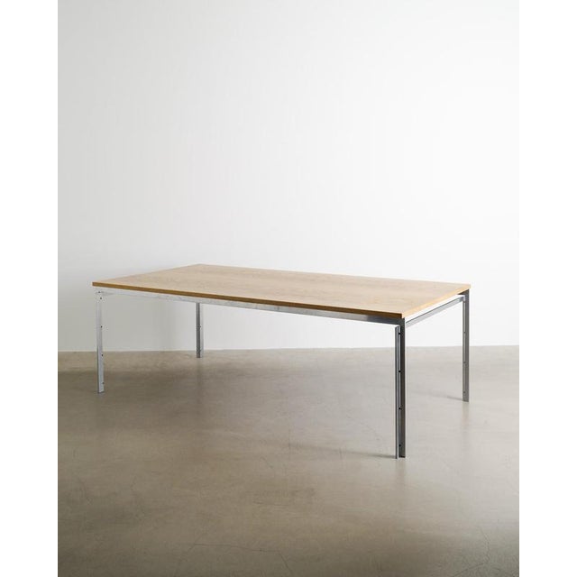 A rare and unique danish mid century rectangular working desk table model "pk-51" in ash wood and a chrome-plated steel...