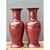 This pair of vintage ceramic vases showcases the classic baluster silhouette long favored in Chinese export porcelain...