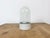 Vintage industrial ceiling or wall light made in former Czechoslivakia during the 1970s. It features a white porcelain...