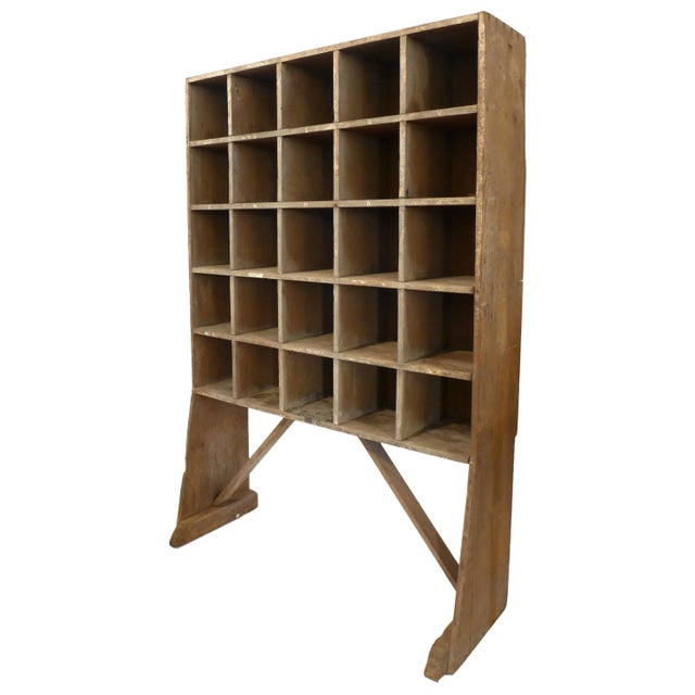 A fantastic rustic wood open-cubby storage unit. A wonderfully weathered and alluring, monochromatic edifice, effectively...