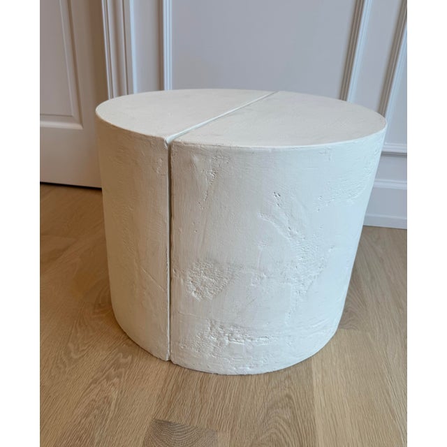 Pair of substantial vintage sculptural demilune side tables in heavily cast white plaster. Each table is formed as a...
