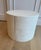 Pair of substantial vintage sculptural demilune side tables in heavily cast white plaster. Each table is formed as a...