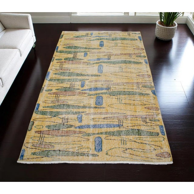 Famous Turkish artist, Zeki Muren designed rug. this colorful and contemporary vintage rug is truly a piece of art. This...